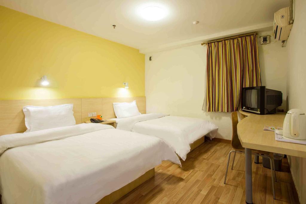 7Days Inn Luoyang Nanchang Road Wangfujing Номер фото